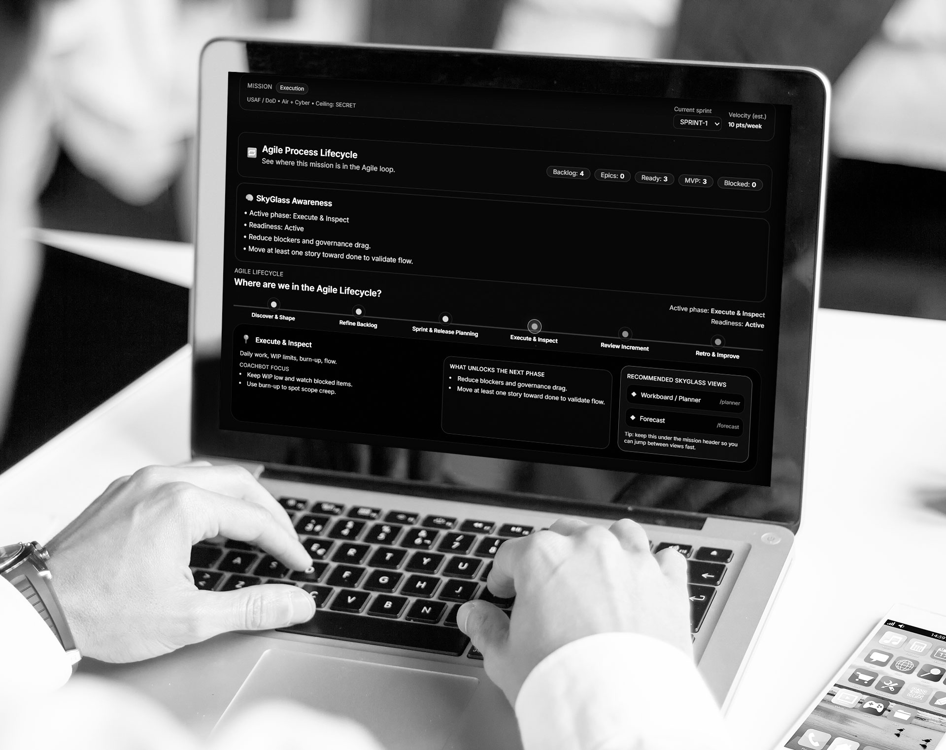 laptop with agile lifecycle shown on screen
